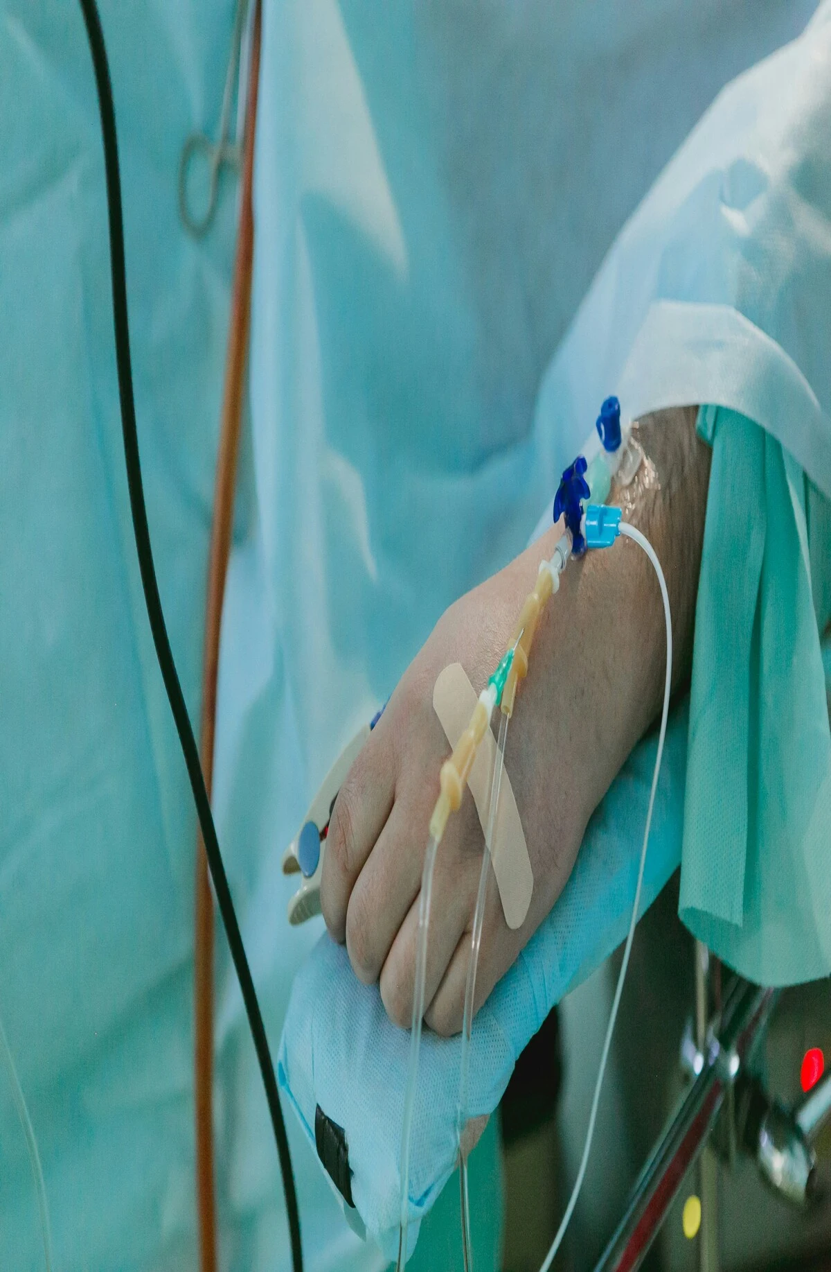 Someone hooked up to an IV and receiving morphine